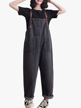 Black denim overalls with brown adjustable straps.